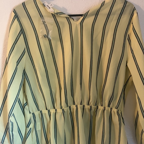 Size large blue and yellow top. New with tags. - Picture 3 of 3